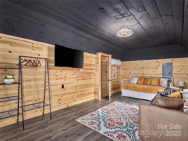 14715 Cruso Rd, Canton, NC 28716 - bedroom with wooden walls, vaulted ceiling, wooden ceiling, a wall mounted AC, and wood finished floors