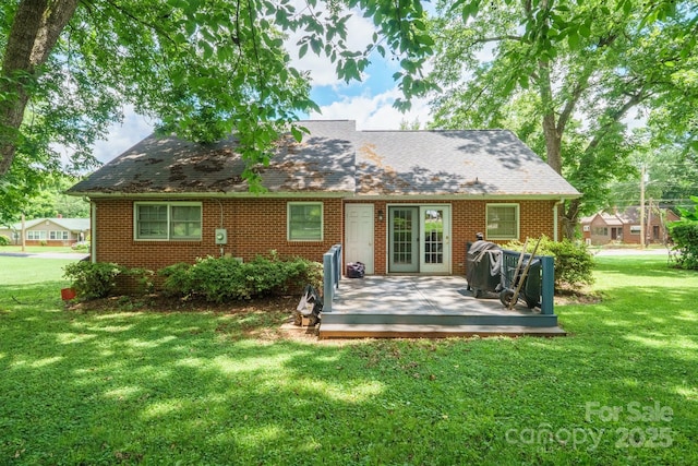 360 S Brady Ave, Newton, NC 28658 - rear view of house with a wooden deck, a lawn, and brick siding
