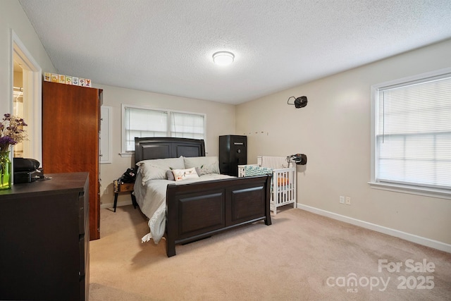 360 S Brady Ave, Newton, NC 28658 - bedroom with light colored carpet and a textured ceiling