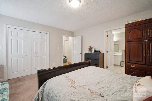 360 S Brady Ave, Newton, NC 28658 - bedroom with a closet, light colored carpet, a textured ceiling, and ensuite bathroom