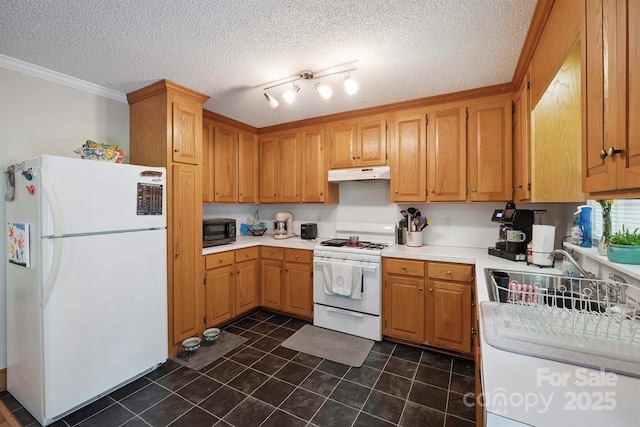 360 S Brady Ave, Newton, NC 28658 - kitchen featuring white appliances, under cabinet range hood, light countertops, dark tile patterned floors, and ornamental molding