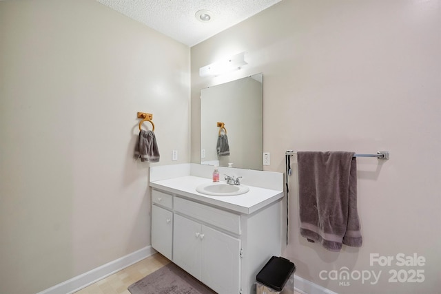 360 S Brady Ave, Newton, NC 28658 - bathroom with vanity and a textured ceiling