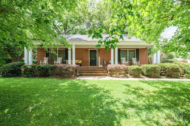 360 S Brady Ave, Newton, NC 28658 - ranch-style house featuring a porch, a front lawn, and brick siding