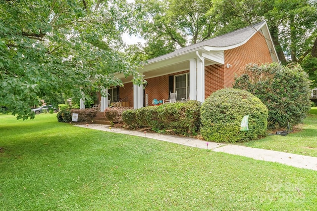 360 S Brady Ave, Newton, NC 28658 - ranch-style house with brick siding, a front yard, and a porch