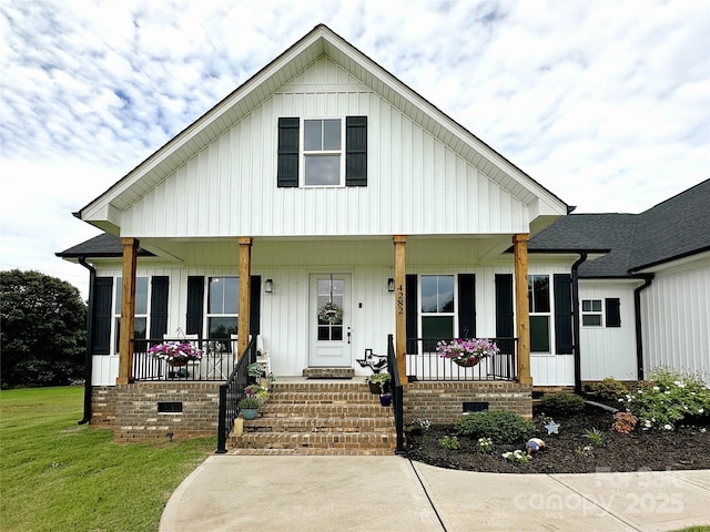 4282 Brandy Creek Ct, Clover, SC 29710 - view of front of home with a porch, crawl space, board and batten siding, and a front yard