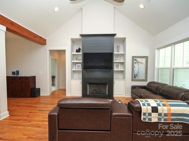 4282 Brandy Creek Ct, Clover, SC 29710 - living room with high vaulted ceiling, light wood-style floors, a fireplace, built in features, and ceiling fan