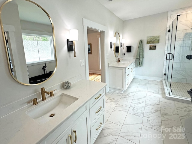 4282 Brandy Creek Ct, Clover, SC 29710 - bathroom with marble look tile flooring, a shower stall, and two vanities