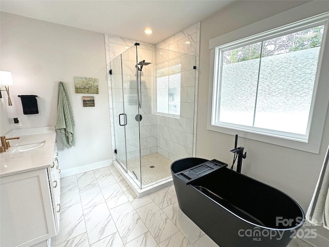 4282 Brandy Creek Ct, Clover, SC 29710 - full bathroom featuring a freestanding bath, marble look tile flooring, a shower stall, recessed lighting, and vanity