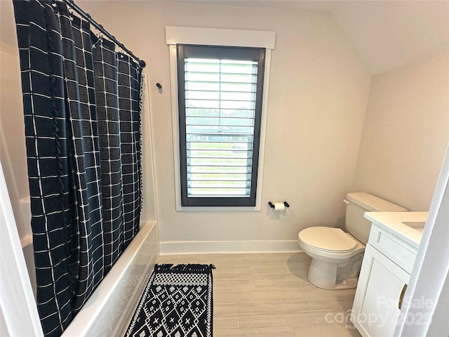 4282 Brandy Creek Ct, Clover, SC 29710 - bathroom with vanity, shower / bath combo, lofted ceiling, and wood finished floors
