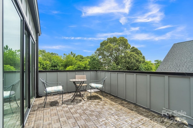 1933 W Trade St, Charlotte, NC 28216 - balcony featuring view of scattered trees