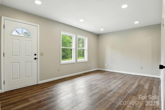 3404 Sheely Rd, Lenoir, NC 28645 - foyer entrance with dark wood-style flooring and recessed lighting