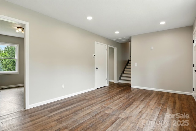 3404 Sheely Rd, Lenoir, NC 28645 - empty room featuring wood finished floors, stairs, and recessed lighting