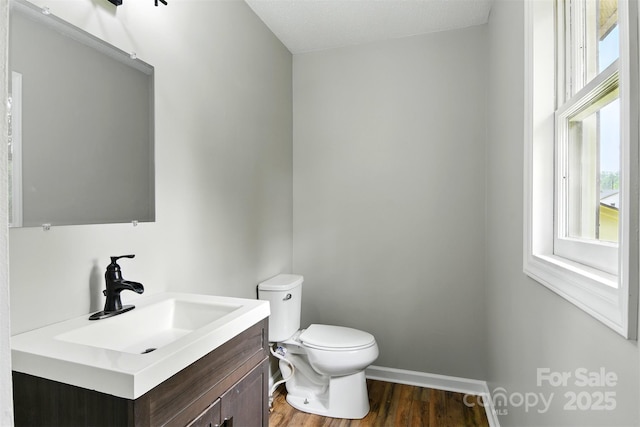 3404 Sheely Rd, Lenoir, NC 28645 - half bathroom with wood finished floors and vanity