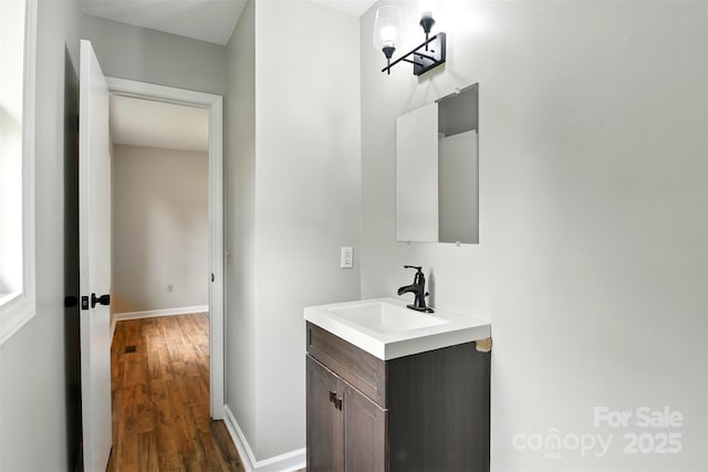 3404 Sheely Rd, Lenoir, NC 28645 - bathroom featuring vanity and wood finished floors