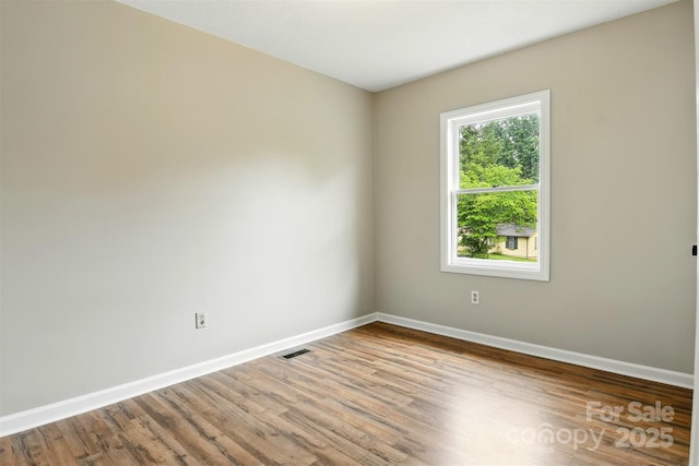 3404 Sheely Rd, Lenoir, NC 28645 - empty room featuring baseboards and wood finished floors