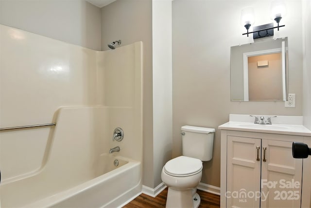 3404 Sheely Rd, Lenoir, NC 28645 - bathroom featuring vanity, wood finished floors, and shower / bath combination