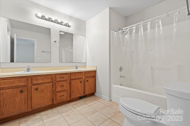 1011 Atherstone St NW, Conover, NC 28613 - bathroom featuring double vanity, tile patterned flooring, and shower / tub combo with curtain