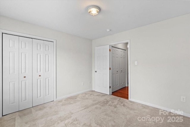 1011 Atherstone St NW, Conover, NC 28613 - unfurnished bedroom with carpet and a closet