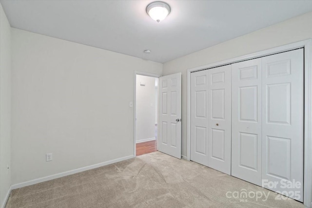 1011 Atherstone St NW, Conover, NC 28613 - unfurnished bedroom with carpet and a closet