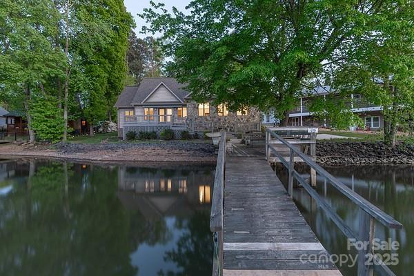 639 Panther Point Trl, Richfield, NC 28137 - dock featuring a water view