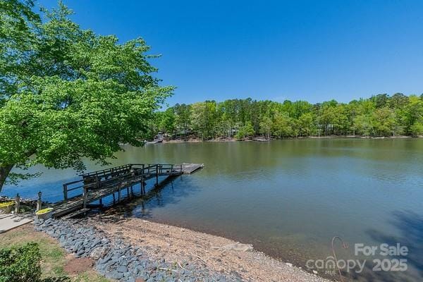 639 Panther Point Trl, Richfield, NC 28137 - dock with a water view and a wooded view
