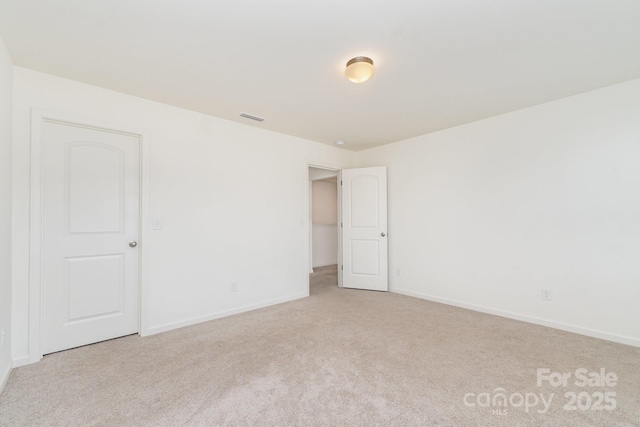 1691 Ashley Lynn Ct, Stanfield, NC 28163 - spare room featuring carpet and baseboards