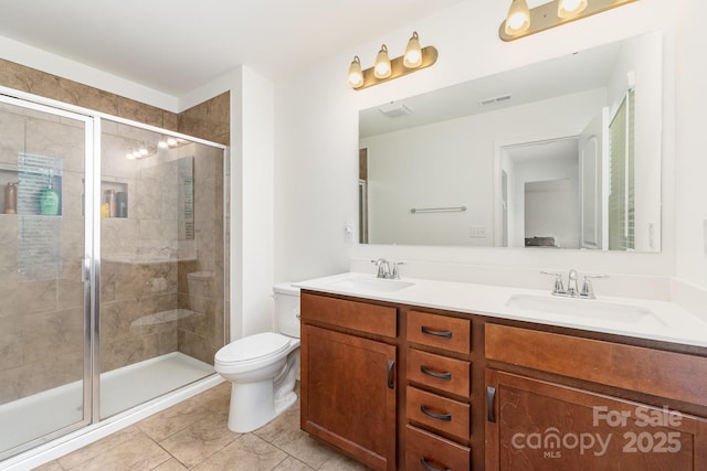 1691 Ashley Lynn Ct, Stanfield, NC 28163 - full bathroom with double vanity, a shower stall, and tile patterned floors