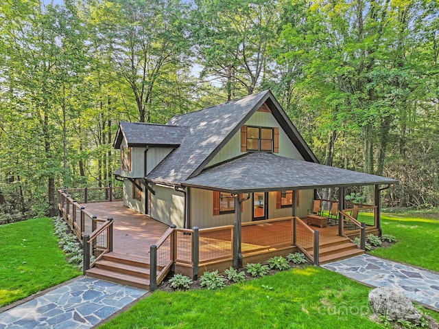327 Flat Ridge Dr, Lake Toxaway, NC 28774 - rustic home with a shingled roof, a front yard, and covered porch
