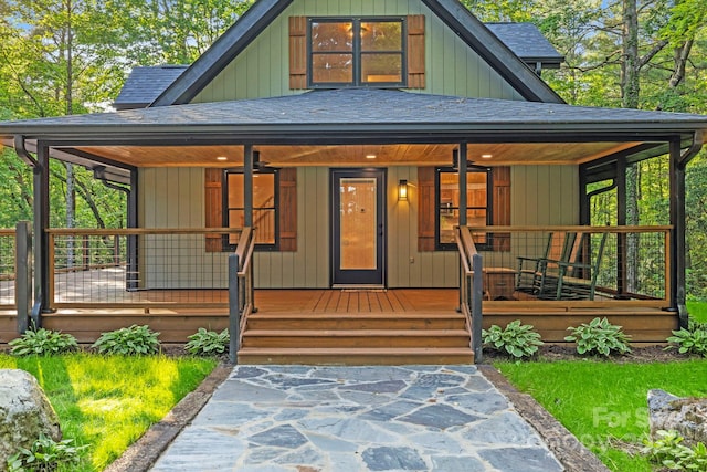 327 Flat Ridge Dr, Lake Toxaway, NC 28774 - view of front facade with a shingled roof and covered porch