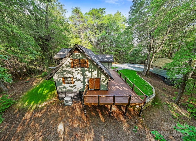 327 Flat Ridge Dr, Lake Toxaway, NC 28774 - back of house featuring a wooden deck and a lawn