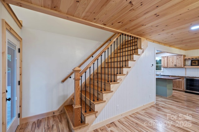 327 Flat Ridge Dr, Lake Toxaway, NC 28774 - stairway with wine cooler, wood ceiling, and wood finished floors