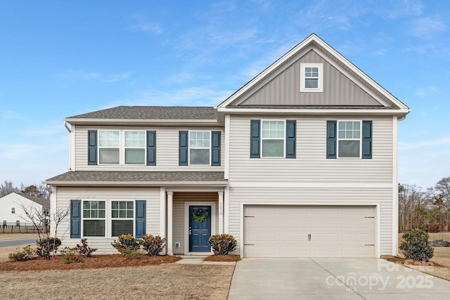 4060 Beacon Ave Unit 148, Monroe, NC 28110 - view of front of house featuring concrete driveway, an attached garage, board and batten siding, and roof with shingles