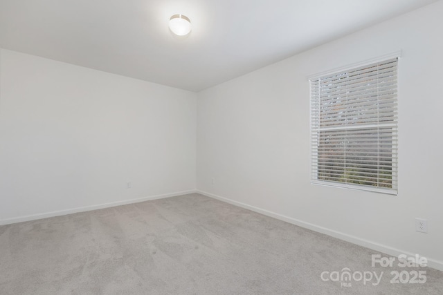 4060 Beacon Ave Unit 148, Monroe, NC 28110 - carpeted spare room featuring baseboards