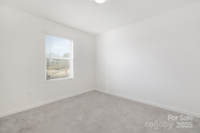 4060 Beacon Ave Unit 148, Monroe, NC 28110 - carpeted empty room featuring baseboards