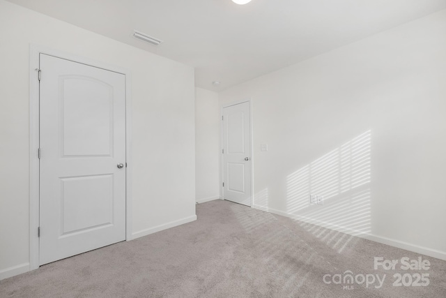 4060 Beacon Ave Unit 148, Monroe, NC 28110 - unfurnished bedroom featuring carpet and baseboards