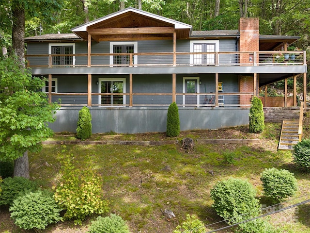 505 Scenic Cir, Waynesville, NC 28786 - back of property featuring a balcony, french doors, and a chimney