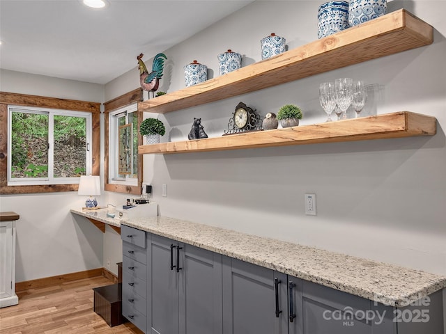 505 Scenic Cir, Waynesville, NC 28786 - kitchen with gray cabinetry, light wood-style flooring, recessed lighting, light stone counters, and open shelves