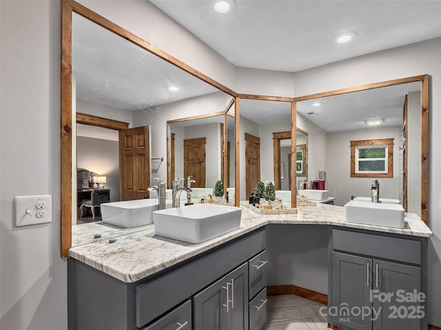 505 Scenic Cir, Waynesville, NC 28786 - bathroom featuring double vanity, recessed lighting, and tile patterned floors