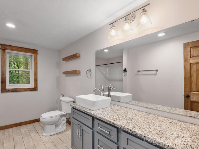 505 Scenic Cir, Waynesville, NC 28786 - bathroom with double vanity, wood finish floors, recessed lighting, and a shower