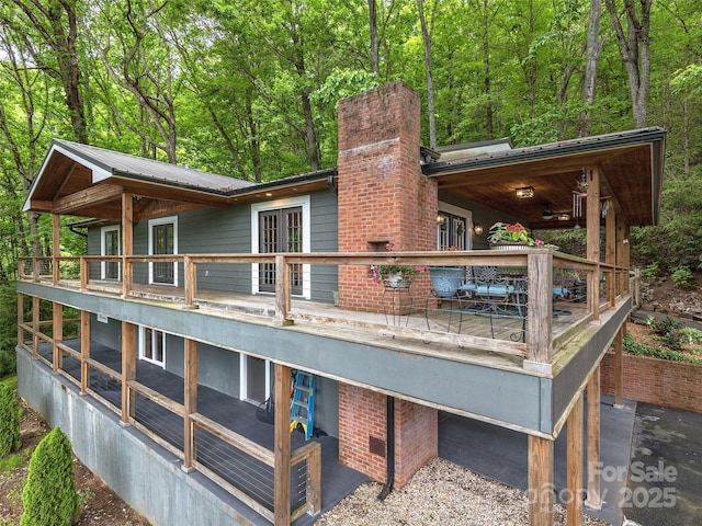 505 Scenic Cir, Waynesville, NC 28786 - rear view of property featuring a chimney, a deck, and french doors