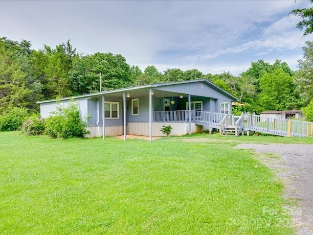 1406 Old Puckett Pl Unit 14, York, SC 29745 - view of front of home with a front yard and a wooden deck