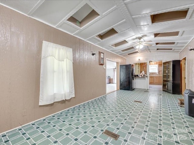 1406 Old Puckett Pl Unit 14, York, SC 29745 - unfurnished living room with coffered ceiling, a ceiling fan, wood walls, and beamed ceiling