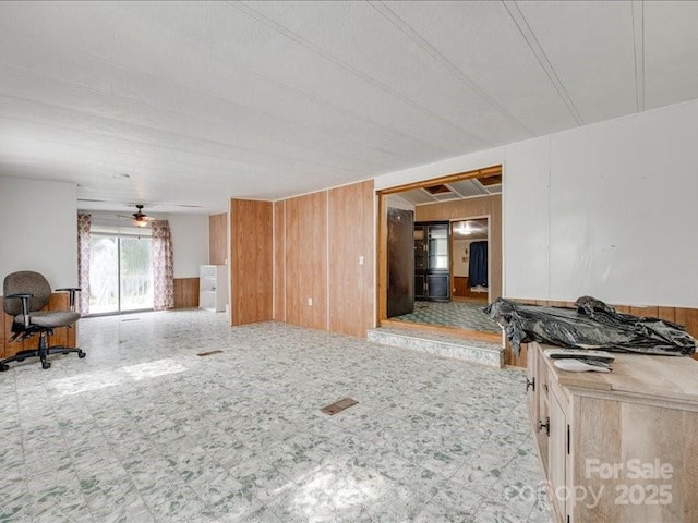1406 Old Puckett Pl Unit 14, York, SC 29745 - living room featuring wooden walls and a ceiling fan