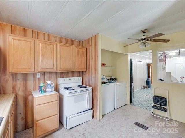 1406 Old Puckett Pl Unit 14, York, SC 29745 - kitchen with white electric range oven, washing machine and clothes dryer, wooden walls, light brown cabinetry, and ceiling fan