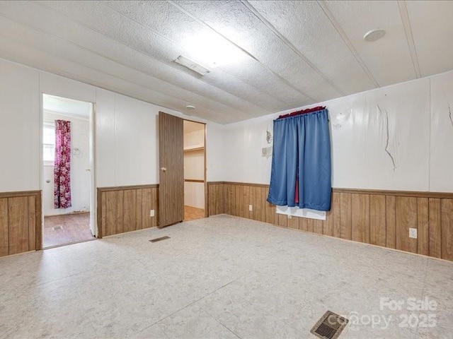 1406 Old Puckett Pl Unit 14, York, SC 29745 - unfurnished room featuring wainscoting and wood walls