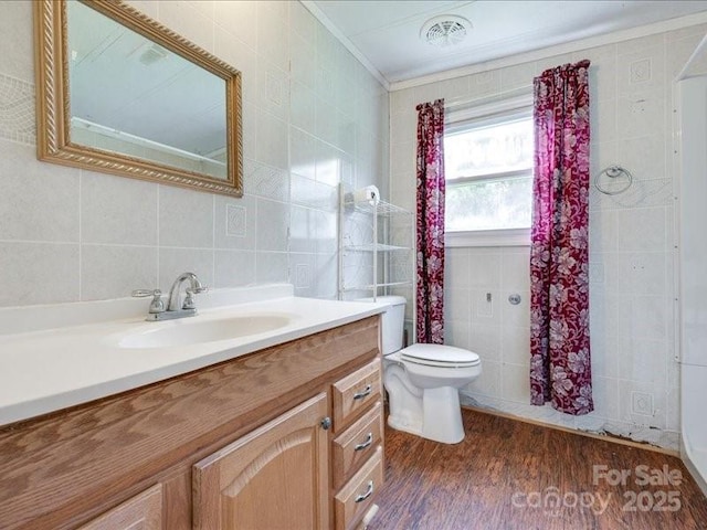 1406 Old Puckett Pl Unit 14, York, SC 29745 - bathroom featuring tile walls, wood finished floors, vanity, and crown molding