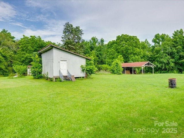 1406 Old Puckett Pl Unit 14, York, SC 29745 - view of green lawn featuring entry steps