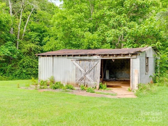 1406 Old Puckett Pl Unit 14, York, SC 29745 - view of outdoor structure with a forest view