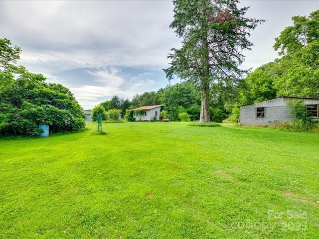 1406 Old Puckett Pl Unit 14, York, SC 29745 - view of grassy yard featuring an outdoor structure