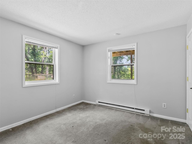 45 Avondale Heights Rd, Asheville, NC 28803 - carpeted empty room with a baseboard radiator and a textured ceiling